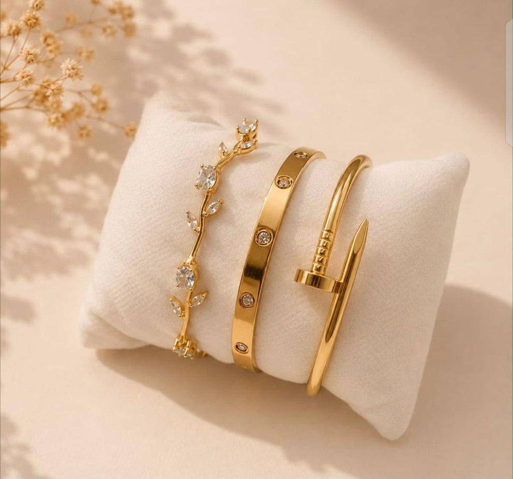 Cartier style nail style and tulip bracelets in gold